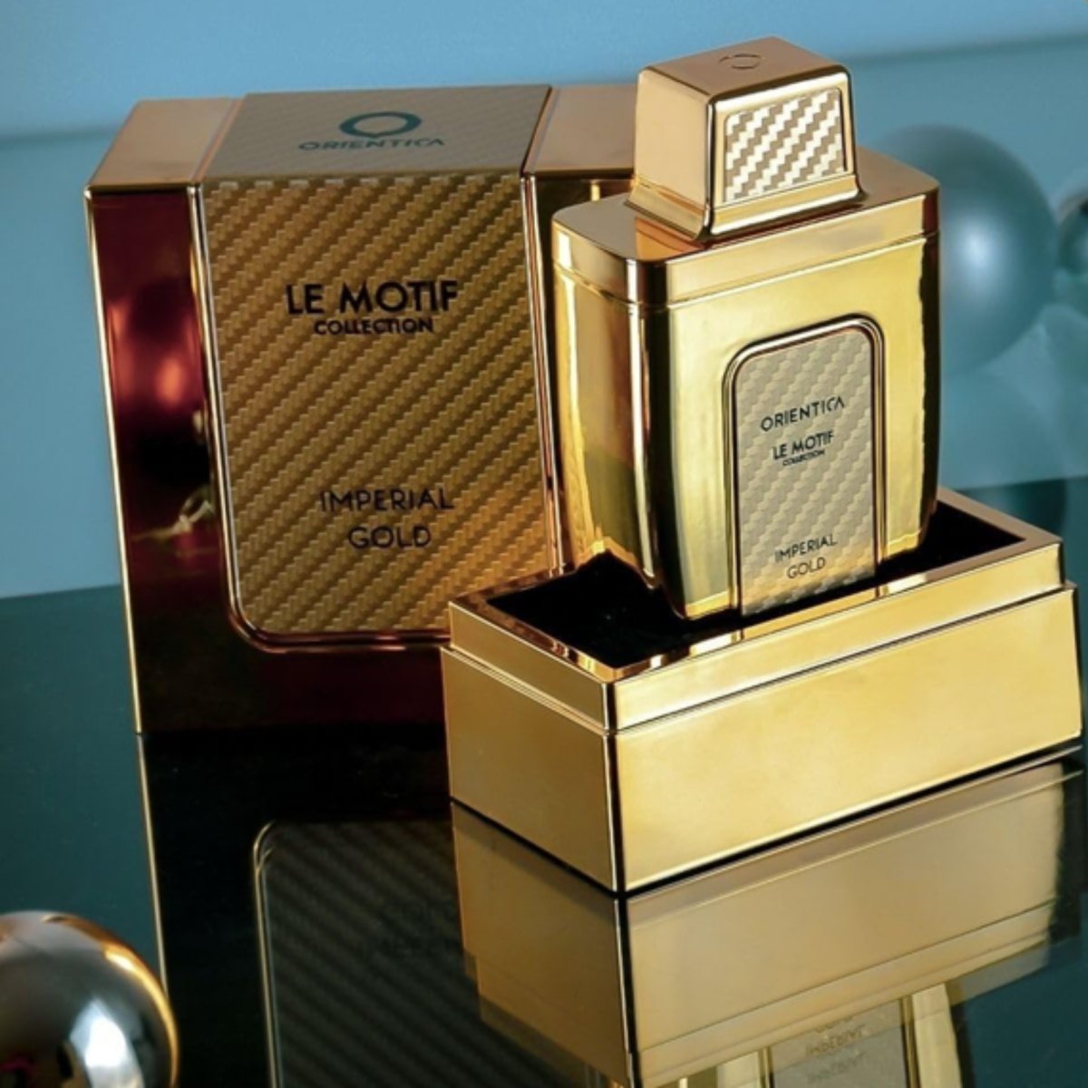 Indulge in the lavish and regal experience of Orientica Le Motif Imperial Gold Eau de Parfum Spray by Al Haramain - Perfume Headquarters - Orientica - Fragrance