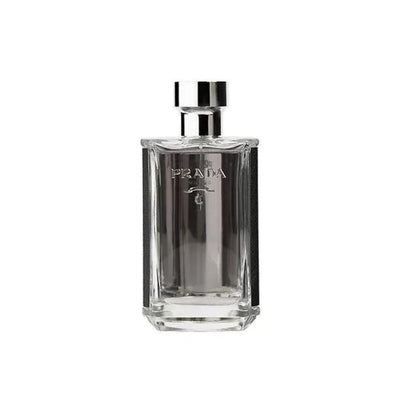 Prada L'Homme by Prada is a fragrance for men that was created in 2016. It is a woody chypre fragrance with notes of neroli, black pepper, cardamom, and carrot seeds. It also has middle notes of iris, violet, geranium, and mate, and base notes of amber, cedar, patchouli, and sandalwood. It has a powdery scent that is well-balanced and can be worn during the day. - Prada - Fragrance
